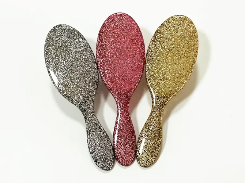 Haarbürste mit glitzerndem Entwirrungskissen