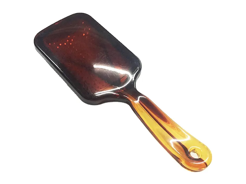 Bernsteinfarbene Paddle-Haarbürste mit Metallstiften