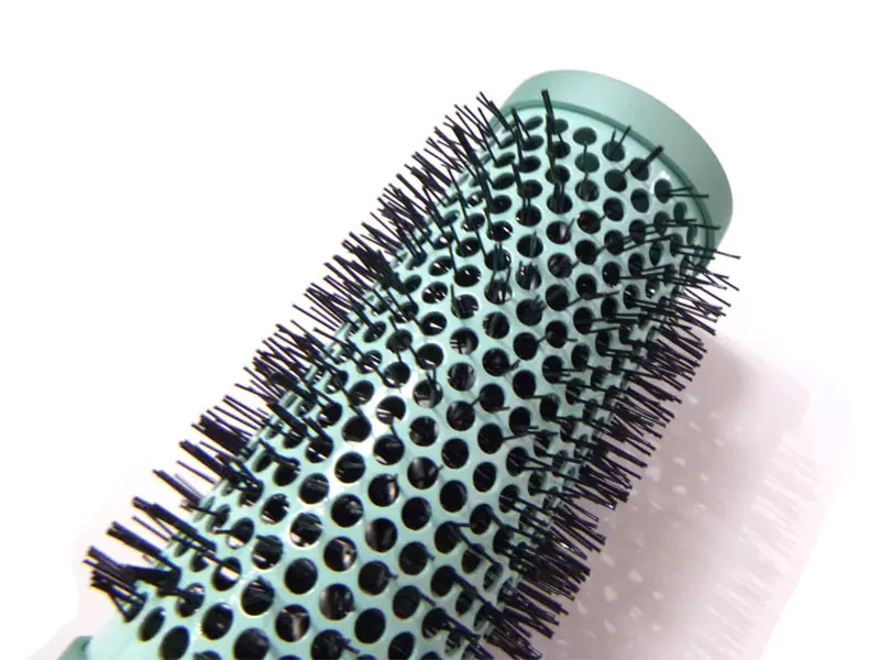 Runde Soft-Touch-Haarbürste mit Gummibeschichtung