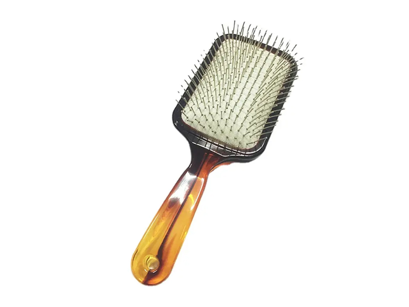 Bernsteinfarbene Paddle-Haarbürste mit Metallstiften